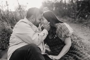 Black and white romantic moments captured in a natural outdoor setting.