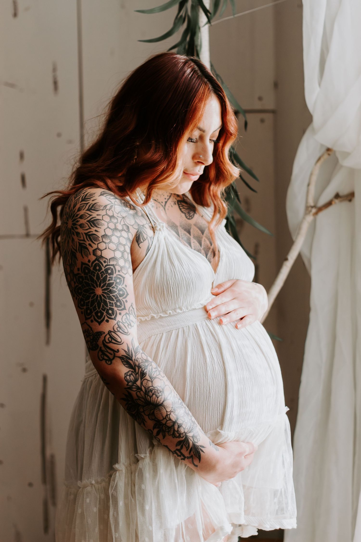 A maternity photoshoot at West 12 Ranch with a western theme.