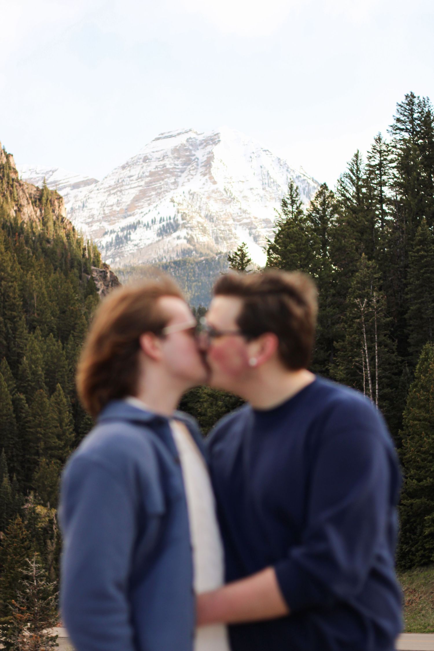 LGBTQ couple kissing, gay couple, LGBTQ friendly, at Tibble Fork Reservoir, American Fork Canyon, Utah County, by Utah County photographer