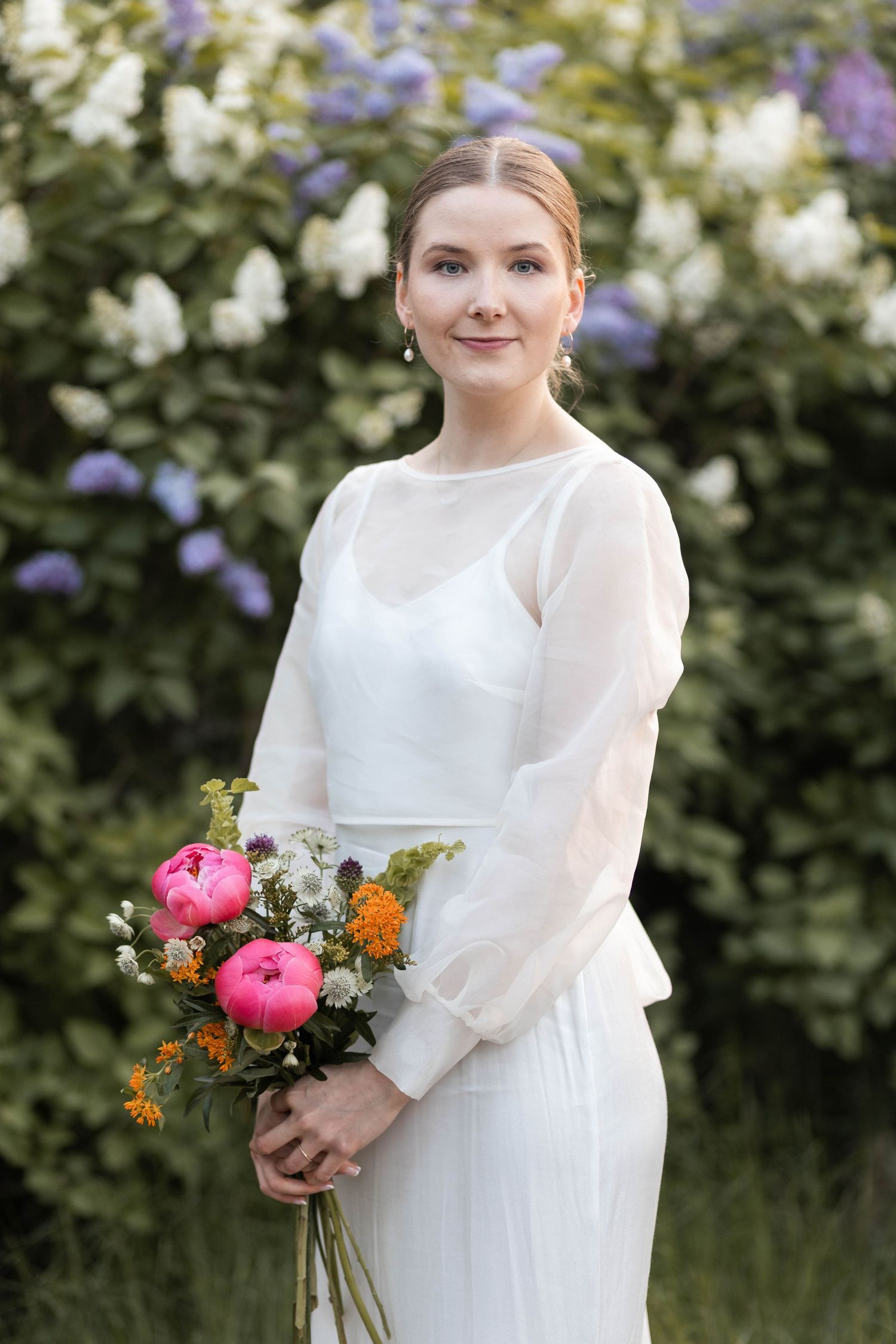 morsian syreenejen edessä