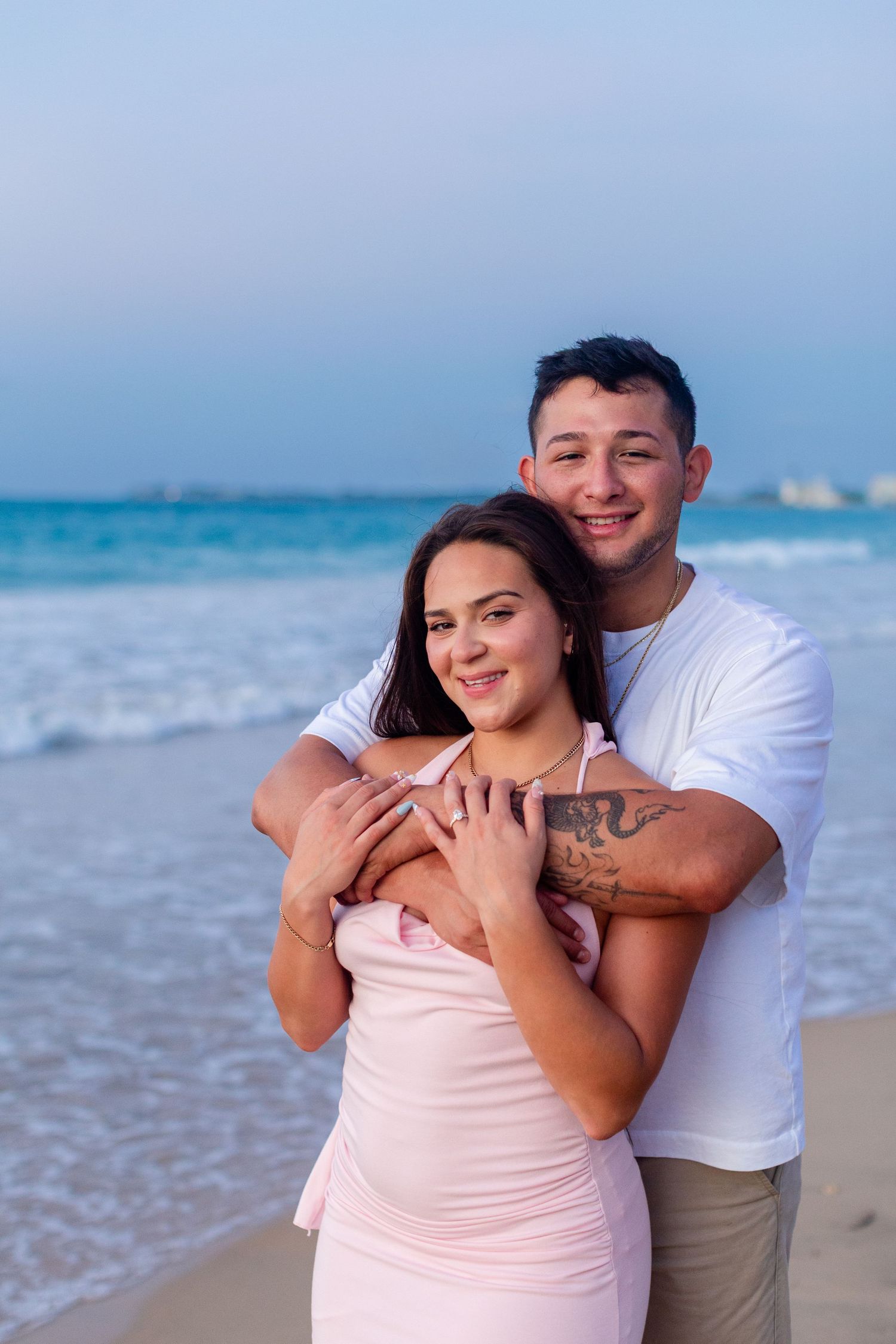 Couples portrait at the beach in Isla Verde, Carolina, Puerto Rico.