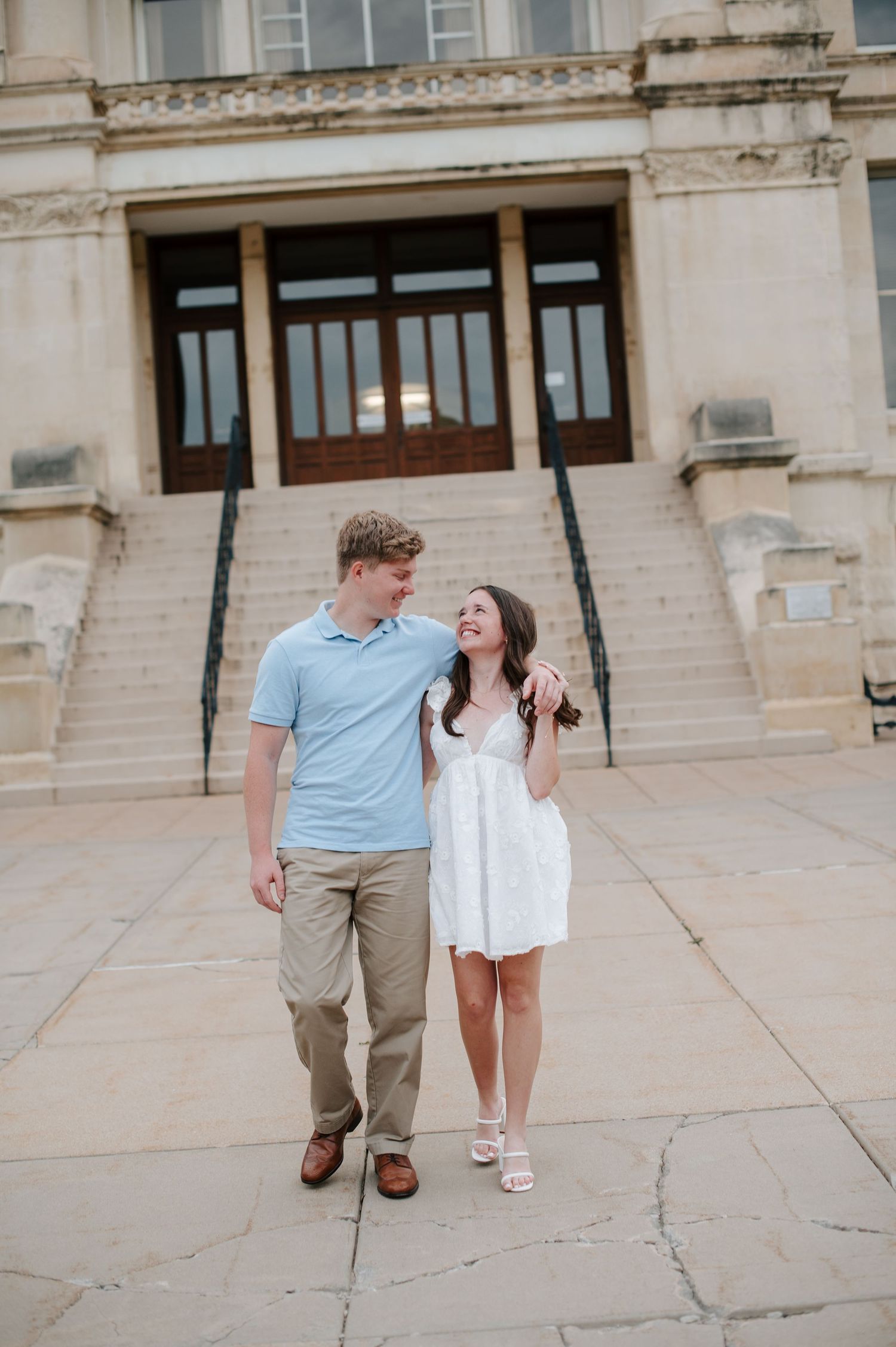 Downtown Wichita KS engagement session by photographer Jessica Nadine Photography.  Classic architecture buildings city courthouse elopement