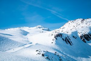 scenic mountain landscape with ski trail signage