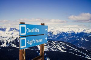 scenic mountain landscape with ski trail signage