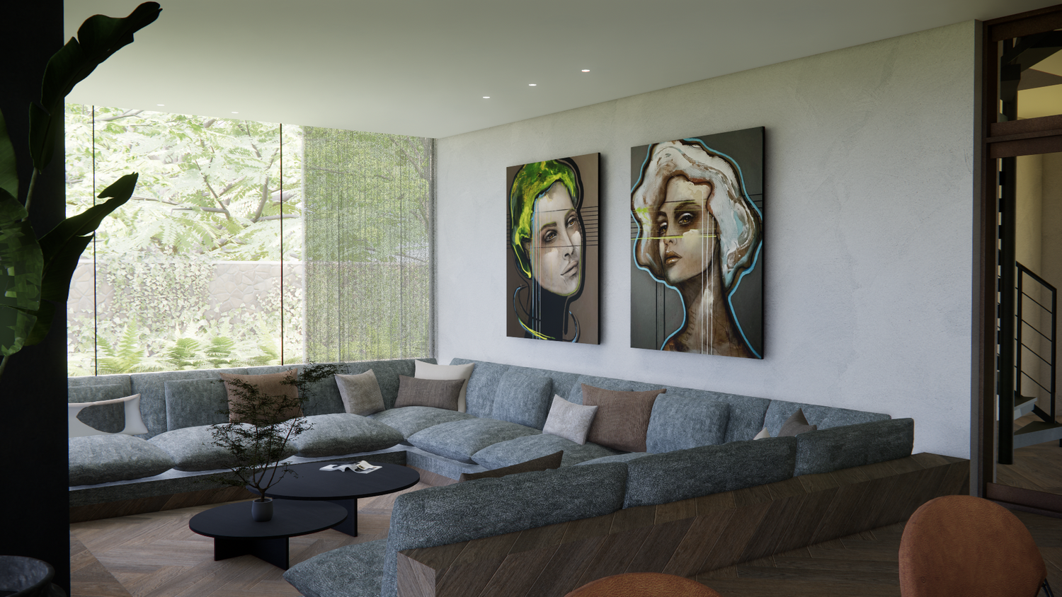 Modern living room with abstract wall art, grey sofa, and panoramic windows offering forest views.