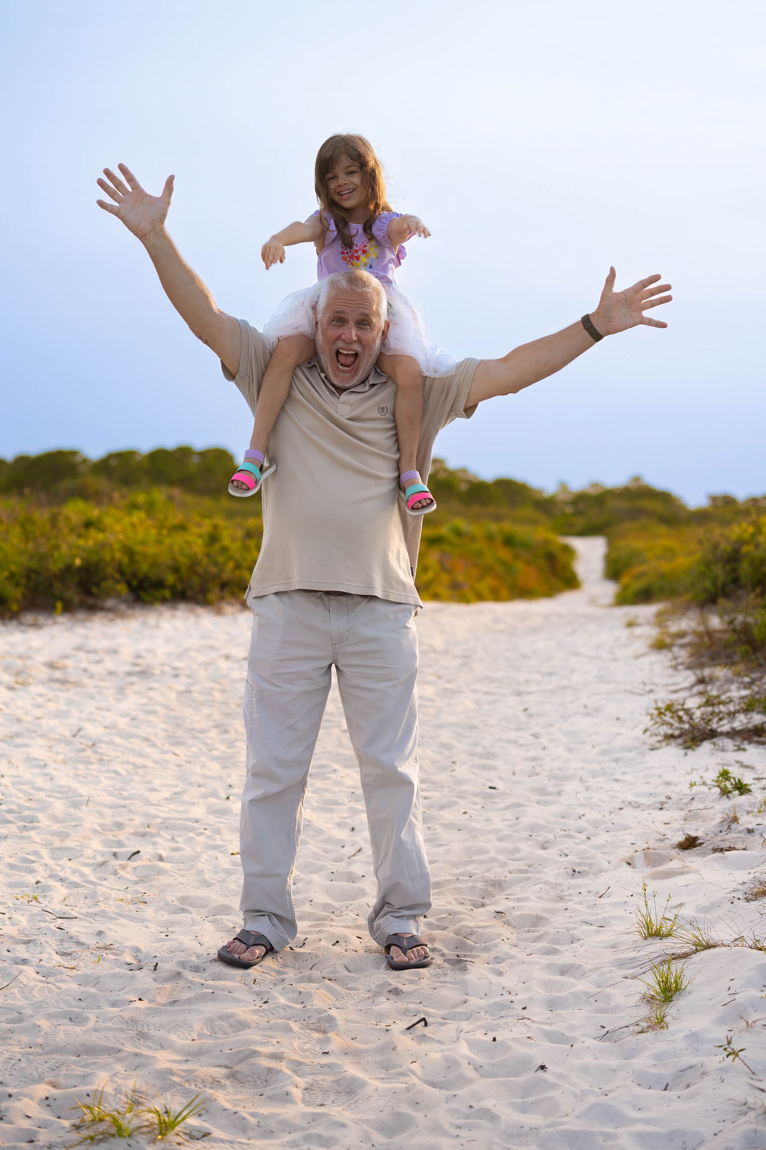 Michael and Evelyn together in juno dunes natural area, juno beach florida, during a family session