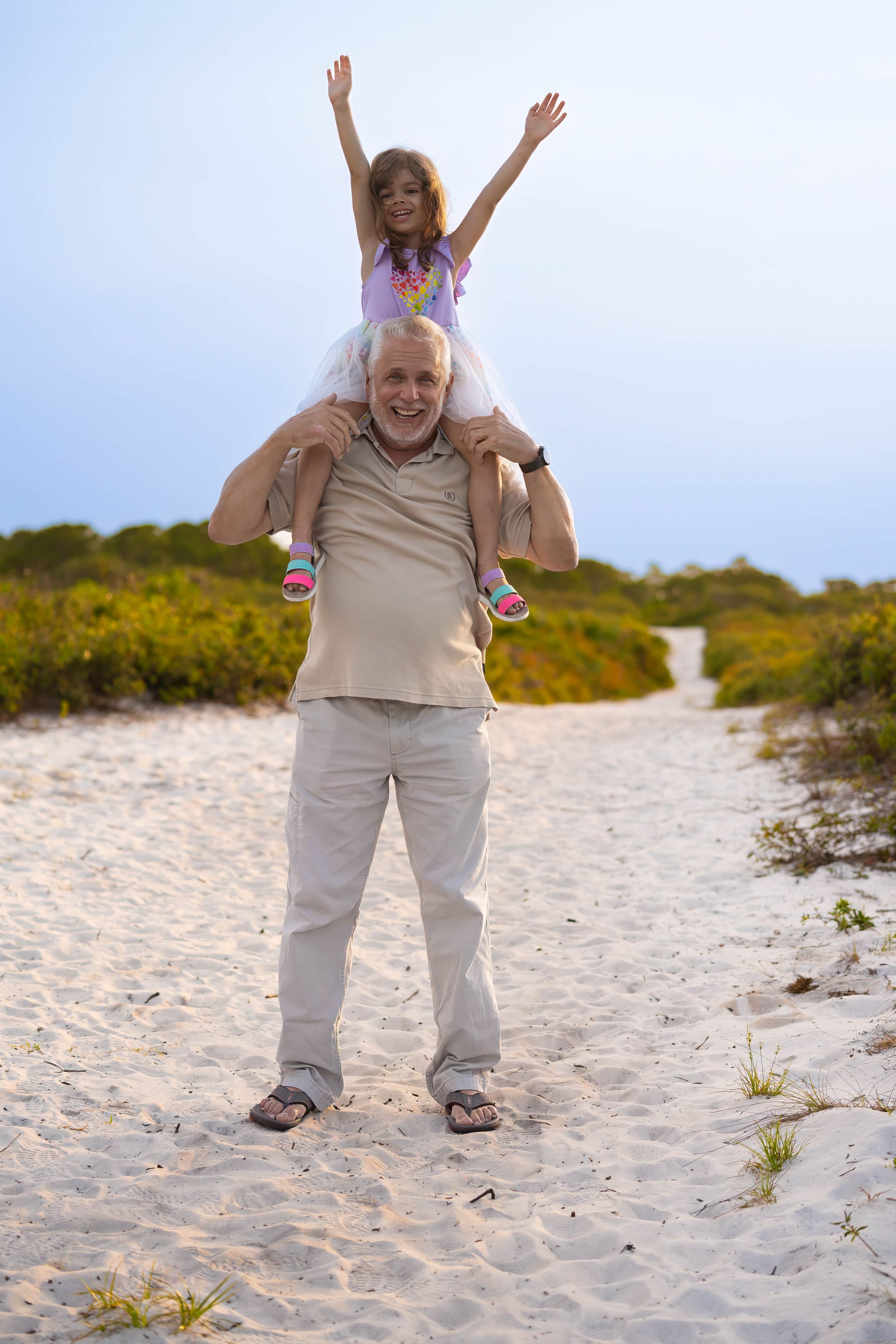 Michael and Evelyn together in juno dunes natural area, juno beach florida, during a family session