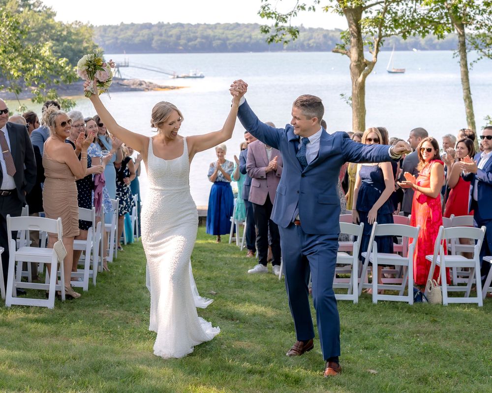 Wedding ceremony overlooking the waterfront at the Harpswell Inn in Harpswell, Maine.