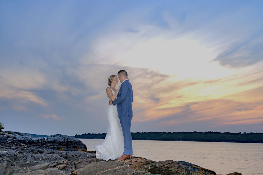 New England coastal wedding inspiration with tented reception and oceanfront ceremony at the Harpswell Inn.