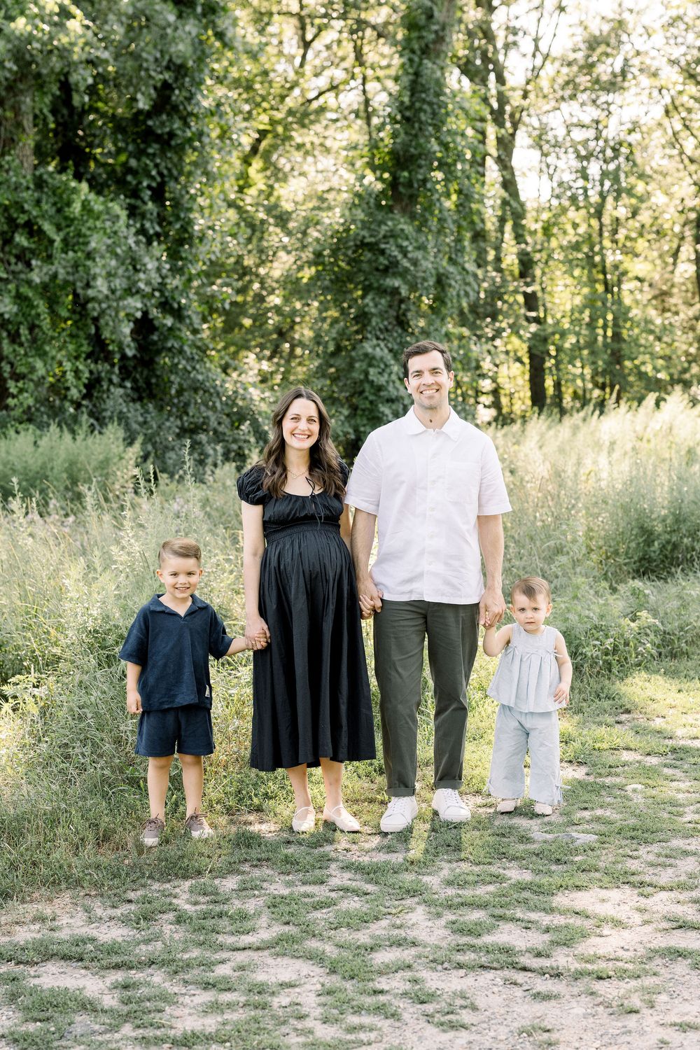 A series of family photos showing parents and children posing together in a natural outdoor setting with trees and grass.