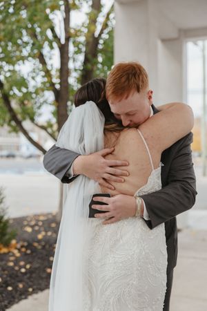 Intimate wedding couple moment captured in sequence against white pillars.