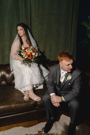 Artistic wedding photo series showing couple sitting on bench with bride in white dress and groom in gray suit.