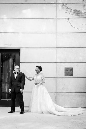 Black and white wedding photography sequence against a classic architectural backdrop.