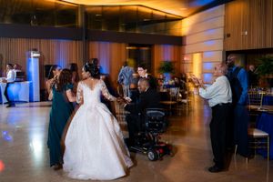 Wedding reception dance floor with ambient lighting and elegant decor.