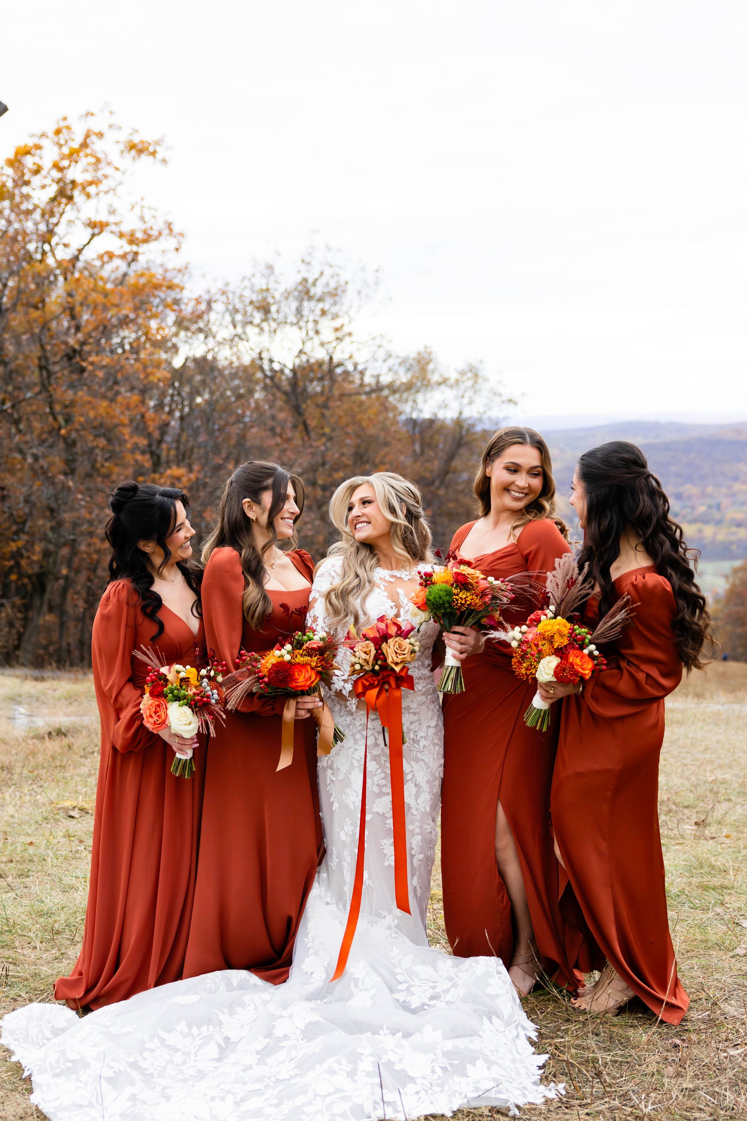 Wedding party wearing burnt orange bridesmaid dresses | Mountain Creek NJ Wedding Photos from NJ wedding photographer