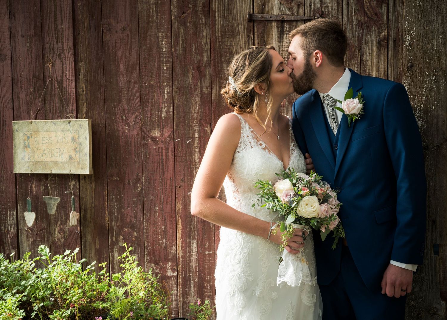 Wedding ceremony sequence at a charming white chapel with guests seated on white chairs along a stone pathway.