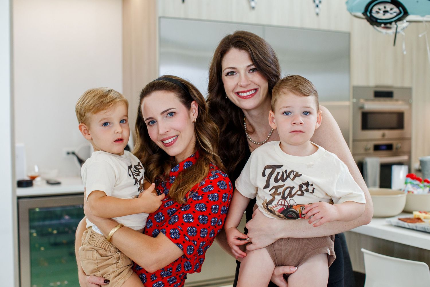 Two mothers with their sons at a birthday party in Dorado, Puerto Rico.
