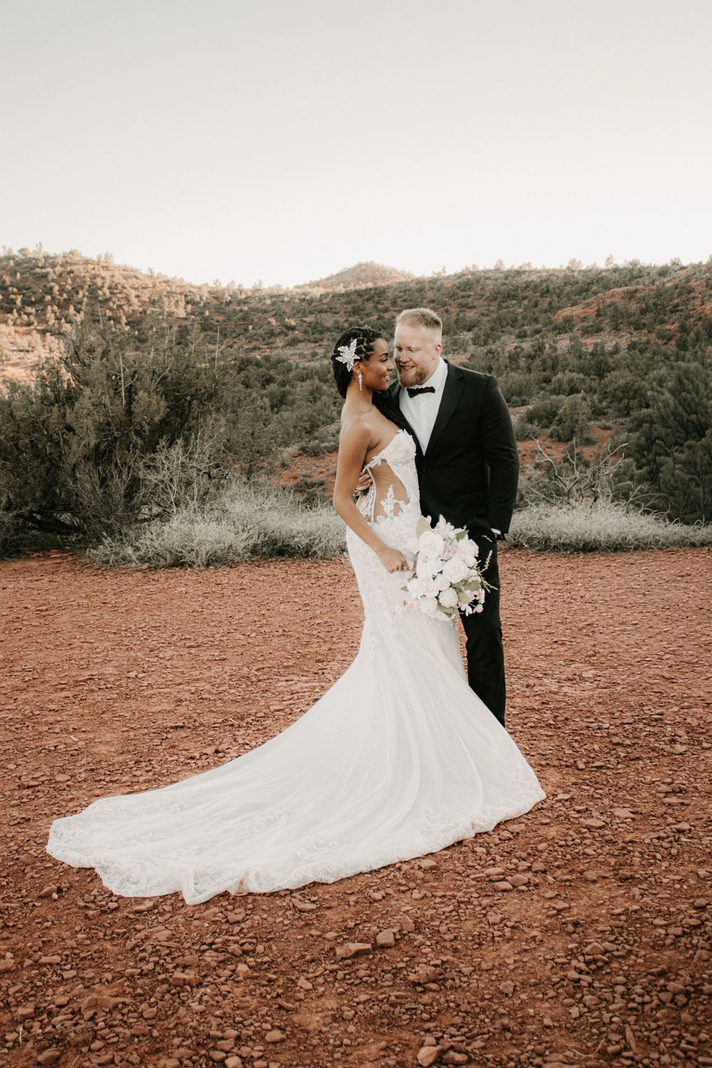 Sedona Arizona couples photography session at Lovers Knoll captured with warm and cinematic storytelling imagery.