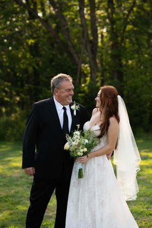 Sweet candid wedding photos showing affection between a bride and companion in a natural outdoor setting.