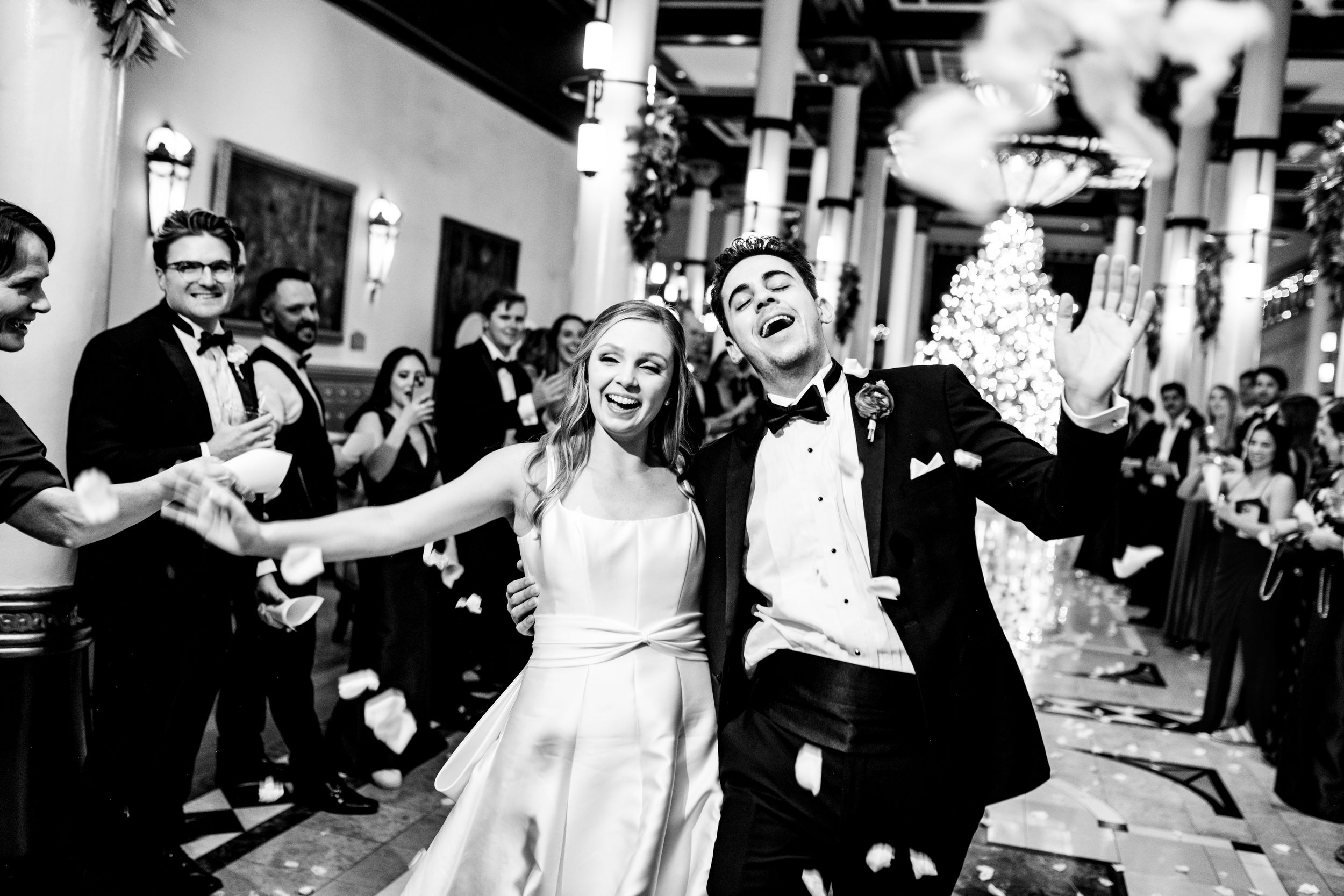 Collage of black and white wedding photos showing dancing, celebration and joyful moments between couples and guests.