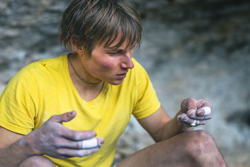 German climber Alex Megos climbing Le Grand Saccage 9a+/b in Buoux, France. Photo Jan Virt.