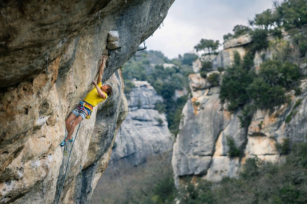 Alex Megos climbing in Buoux, France. Photo Jan Virt.