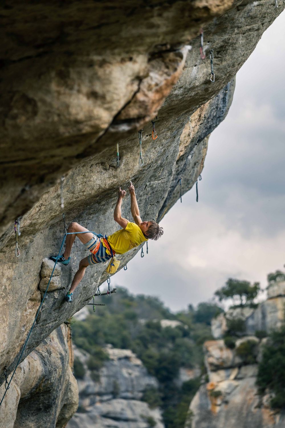 Alex Megos climbing in Buoux, France. Photo Jan Virt.