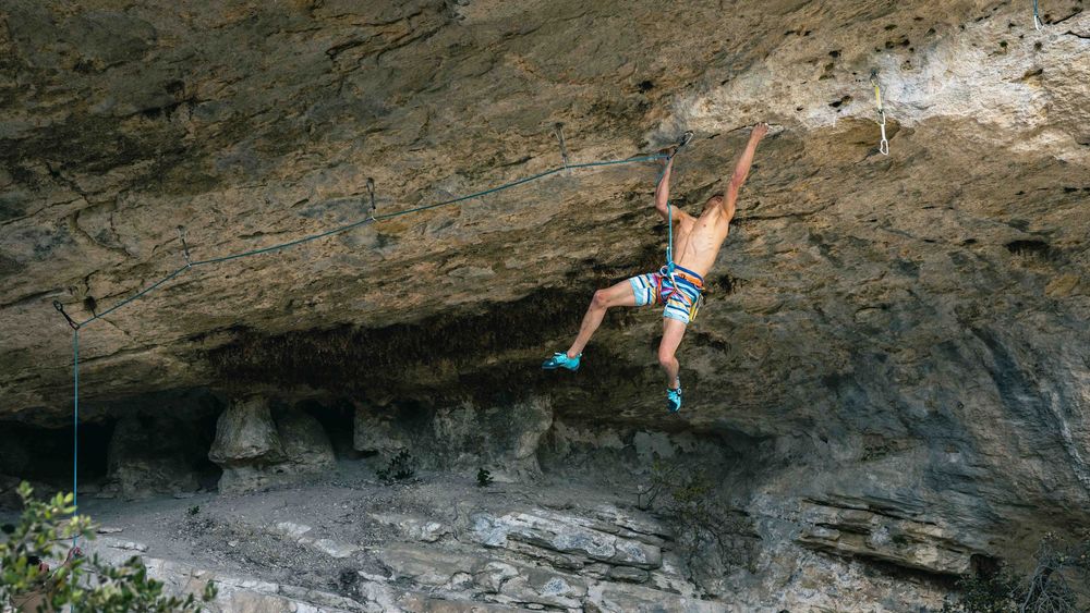Alex Megos climbing in Buoux, France. Photo Jan Virt.