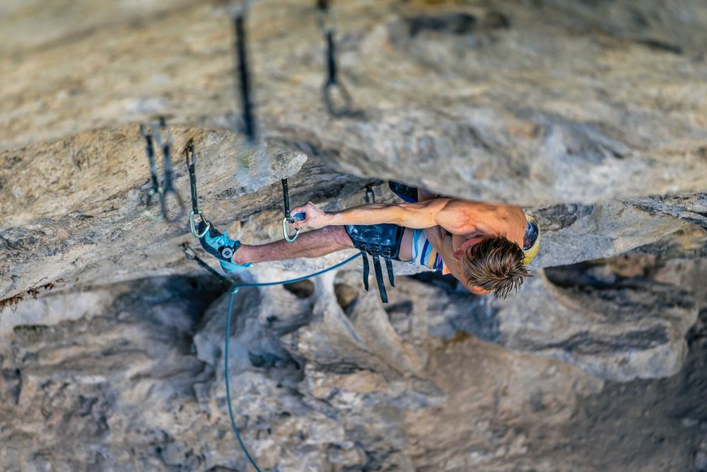 Alex Megos climbing Le Grand Saccage 9a+/b in Buoux, France. Photo Jan Virt.