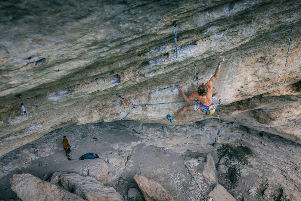 Alex Megos climbing Le Grand Saccage 9a+/b in Buoux, France. Photo Jan Virt.