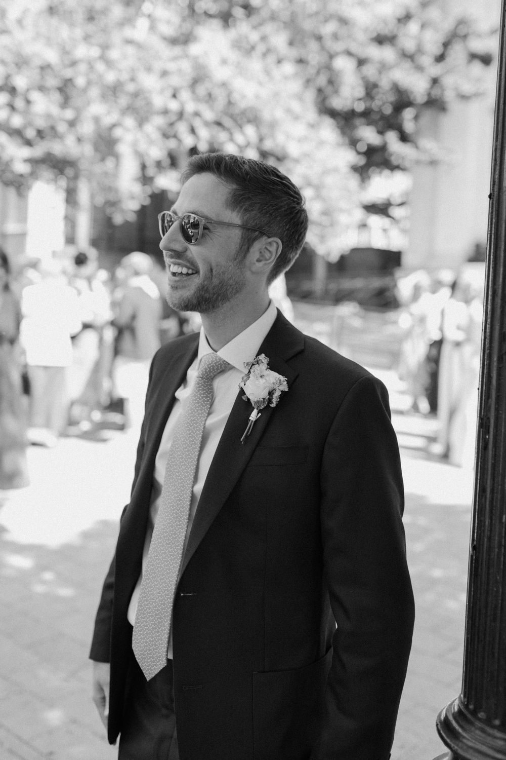 Groom sees his bride for the first time at Islington Town Hall wedding.