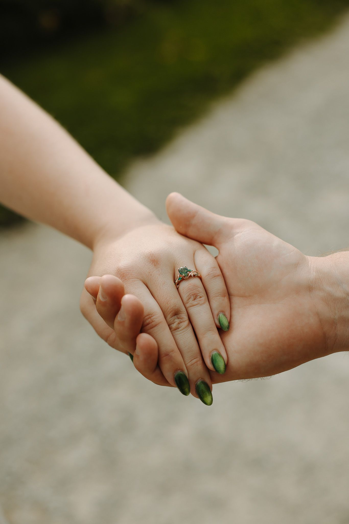 Close-up shots of hands with engagement rings showing a romantic connection.