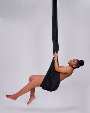 Pregnant woman on a swing