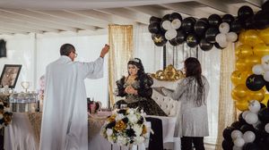 A series of event photos showing black and white balloons and people in white attire celebrating at an elegant party.