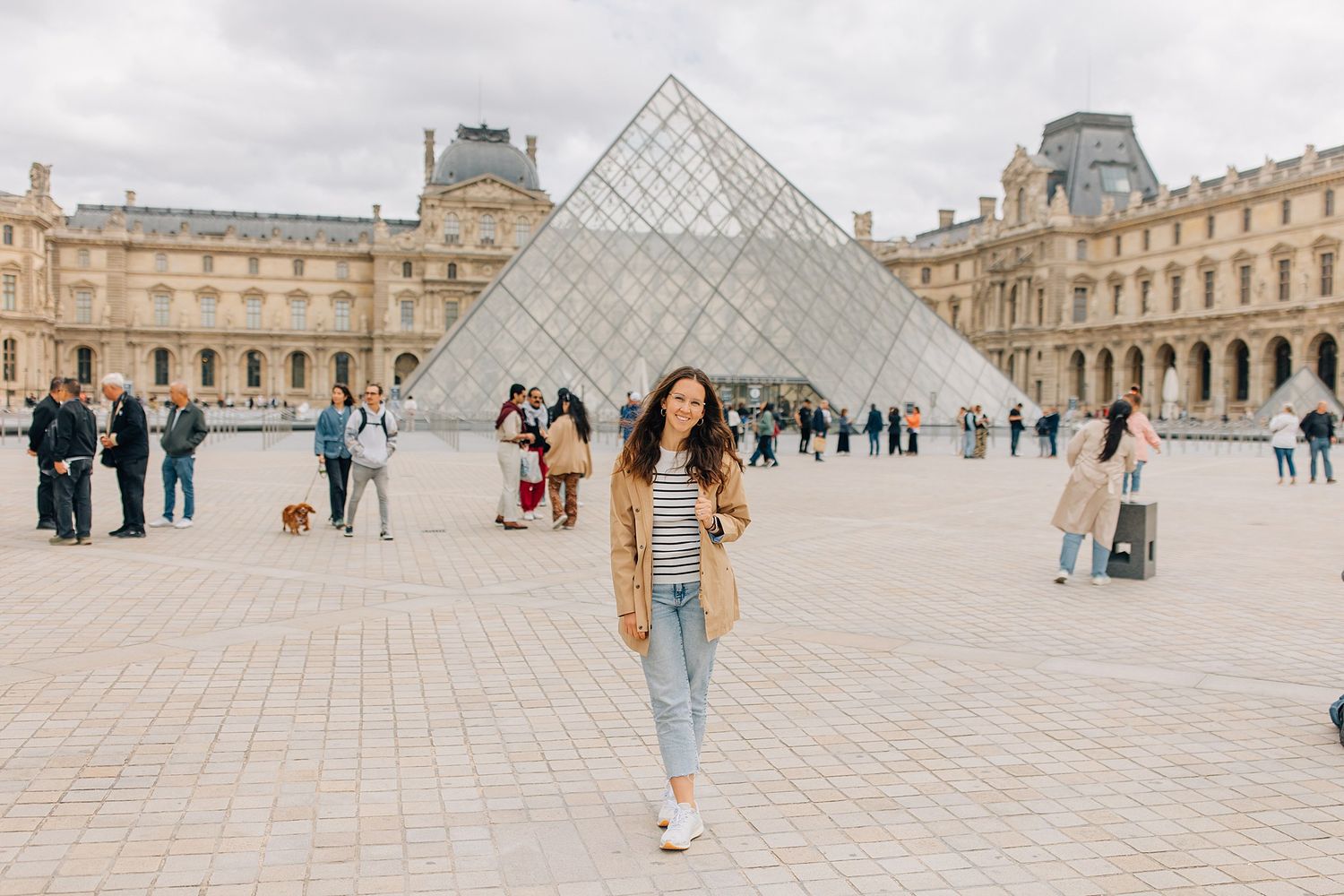 Woman in front of the Louvre in Paris, France