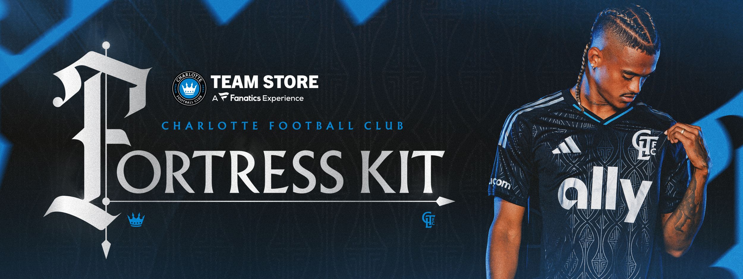 Charlotte FC Fortress Kit banner featuring a player in the dark jersey available at the Team Store.