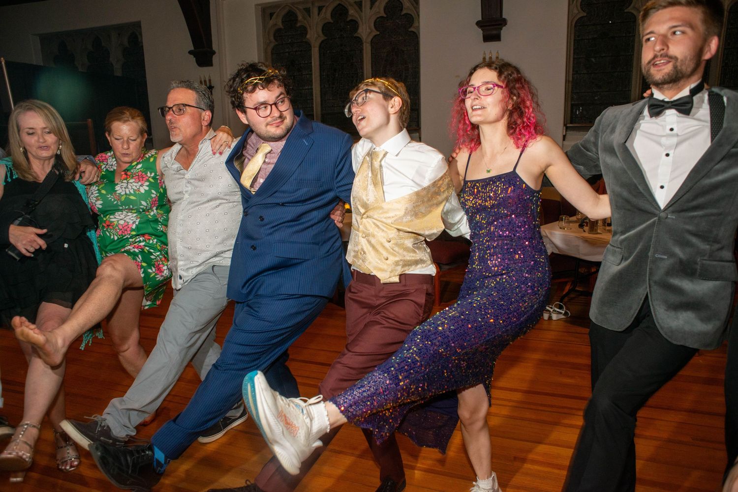 A sequence of dance party photos showing people having fun on a wooden dance floor at a celebration event.