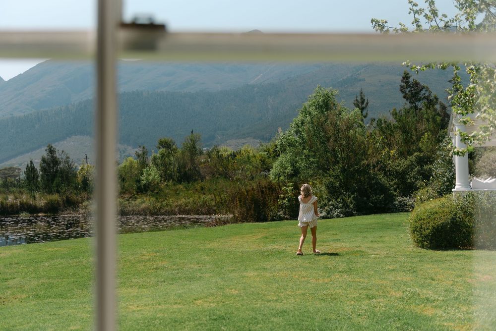 Rolling green hills and mountains create a scenic panoramic landscape view.
