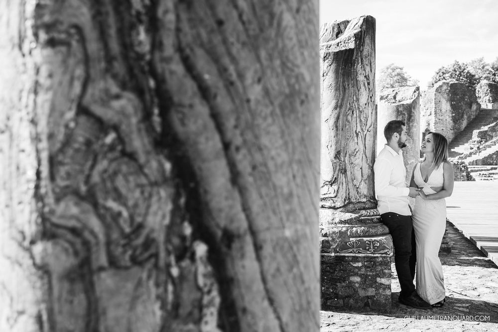 Artistic black and white portraits showcase tender moments between a couple.