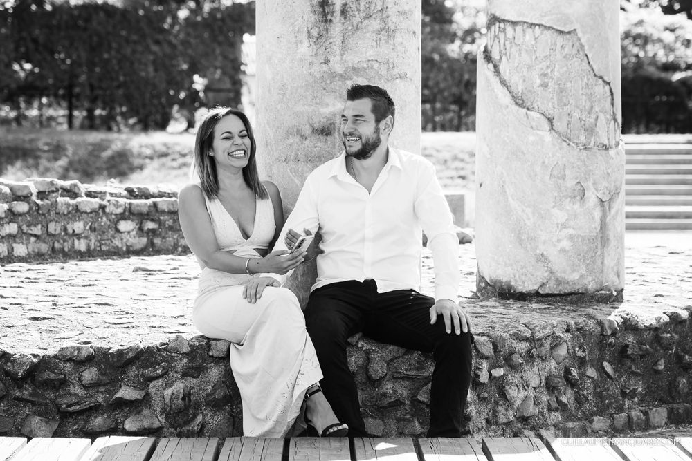 Candid black and white photos show couple laughing and embracing outdoors.