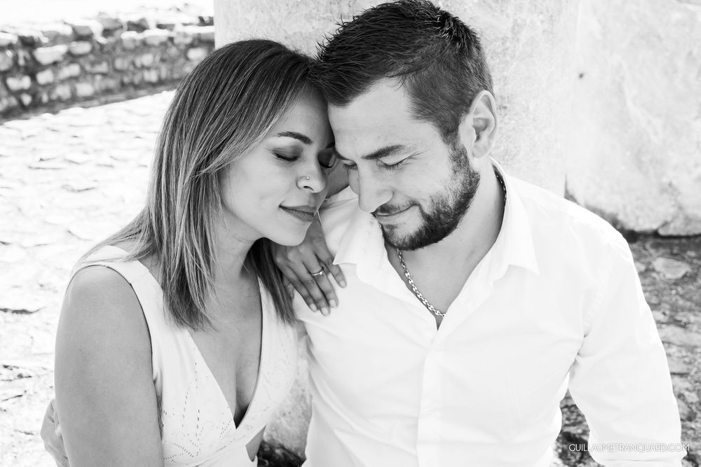 Black and white portraits capture sweet moments between a couple.