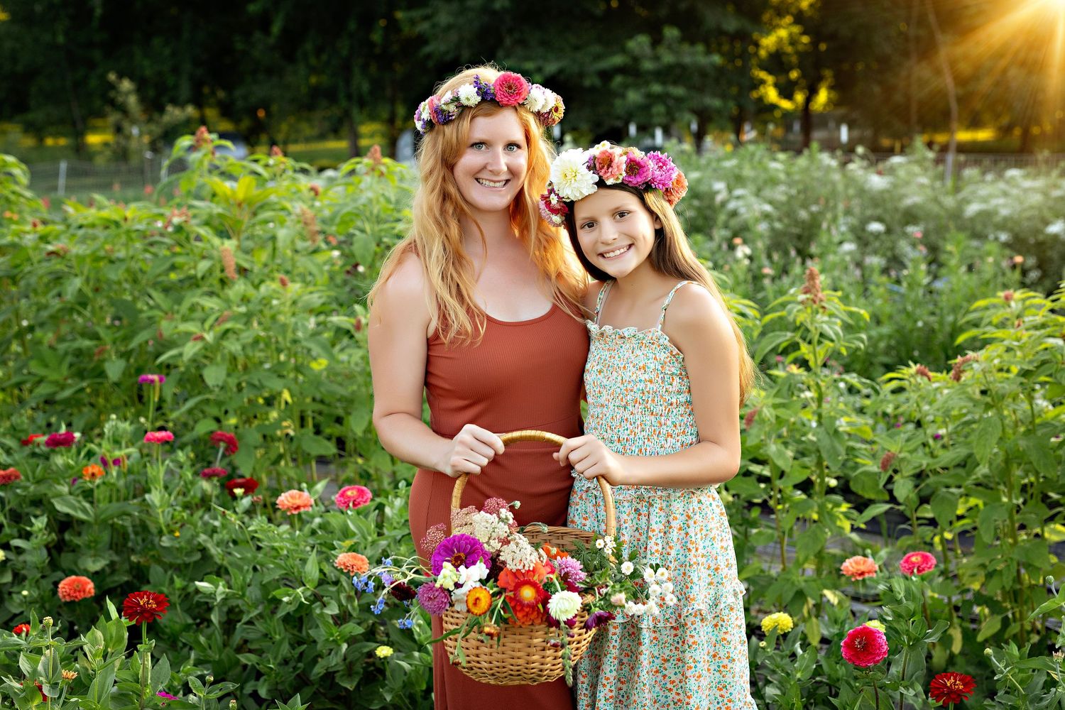 Mother & daughter smiling together among colorful flowers during summer mini sessions at First Roots Flower Farm in Oconomowoc, Wisconsin.