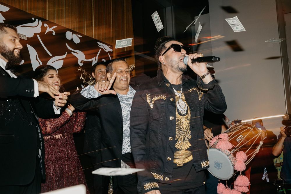Animated party scene with guests dancing and celebrating in formal attire.
