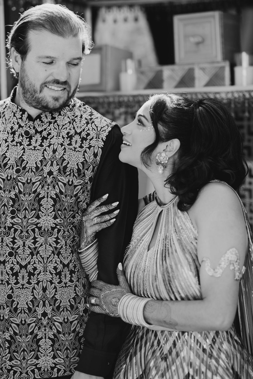 Black and white romantic portraits showing couple in coordinated formal attire.