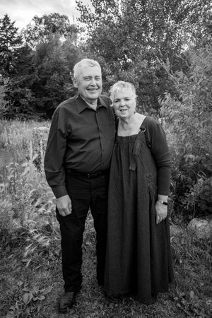 An older couple in black and white