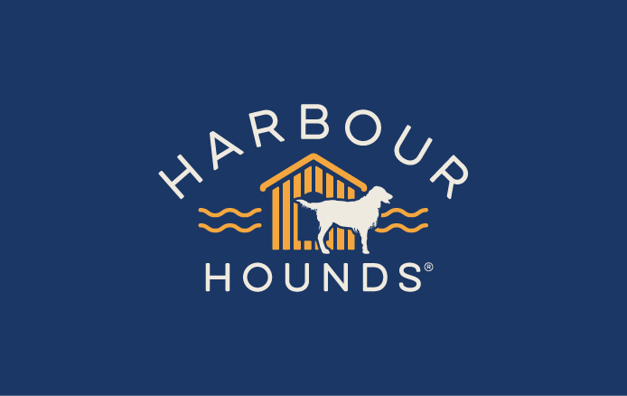 A stylized logo design featuring a dog silhouette and pier on a navy blue background with text reading Harbour Hounds.