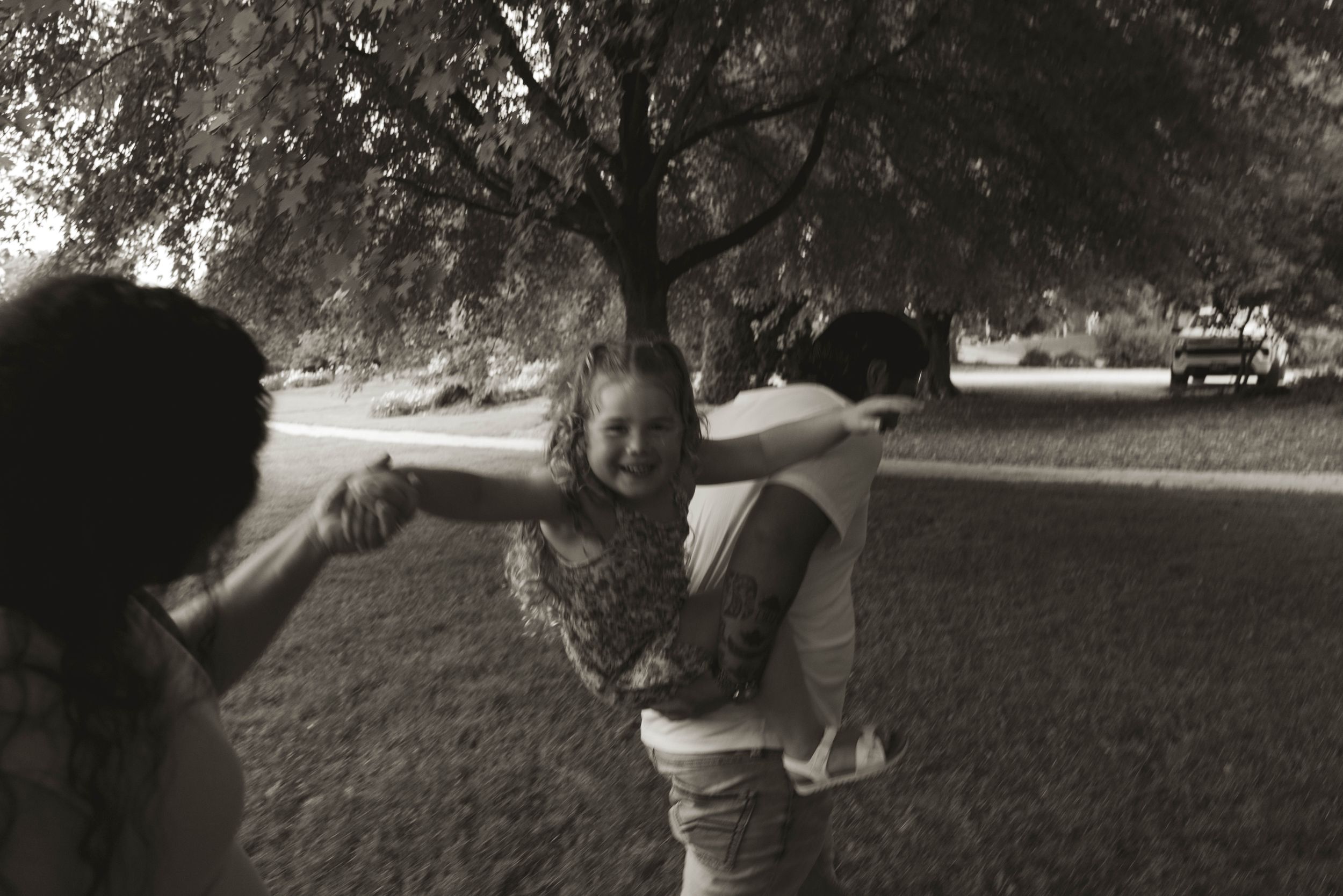 Black and white series of candid outdoor photo moments.