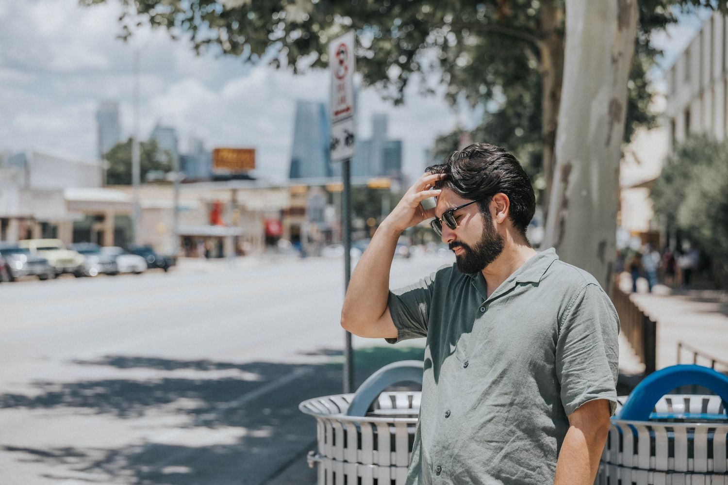 A series of casual lifestyle photos showing a person in a gray shirt sitting and walking near outdoor benches and pathways.