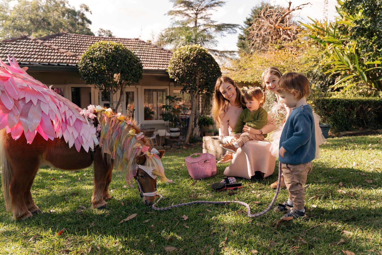 Northern Beaches Sydney Unicorn visit birthday photoshoot with twins and little girl and their mom