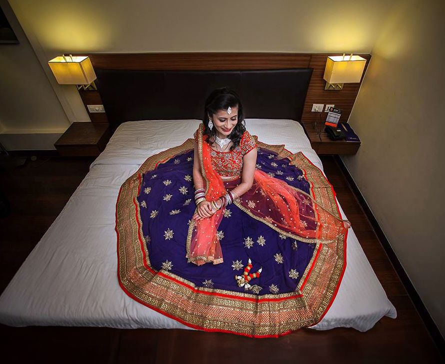 Top-down photo of an Indian bride getting ready at a hotel for her wedding in Wellington, New Zealand.